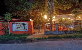Falling Coconuts Grill And outside