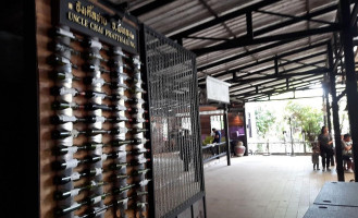 Uncle Chai Phatthalung outside